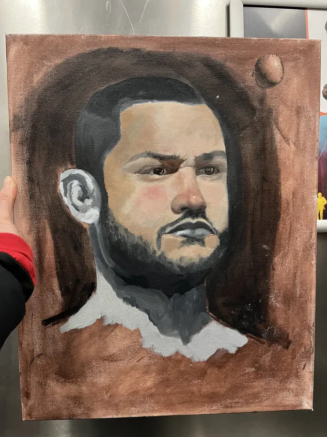 Portrait of a bearded man against a brown ground